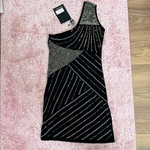 Elegant Black and Gold One-Shoulder Dress